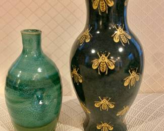 Left: $40 - signed pinched vase - 7.5" H; right: $20 - 10" H