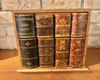 $120 "Liquor Cellar Trompe L’oeil Fake Books"
Lovely liqueur cellar composed of four glasses and a bottle from the 50s in a beautiful imitation book box! Box/bar - 8.25" H, 10.25" W, 7" D