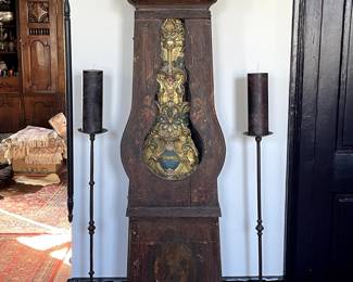 French Moblier Clock, 1800's. 94"h. Price $3250. Pair of 1600's Iron Ballister Candle Holders from Barcelona, Spain 48" tall. Price $1575 for pair.