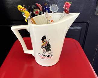 Vintage Dewars Water Pitcher $60. Vintage Set of 12 Swizzle Sticks $175 or $16 each.