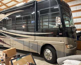 2010 Winnebago Adventurer 37F  25,900 MILES. Will be priced under $70,000.