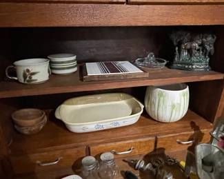 lots of cool finds in this antique  cabinet 