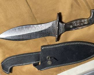  large collection of knives- many damacus blades-  more pics to come !!