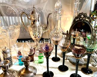 Sterling Silver weighted candle holders. Fun Blefeld Cordial colored glass barware. Filagree metal frame mirror. Crystal flower basket. Vintage coffee pot