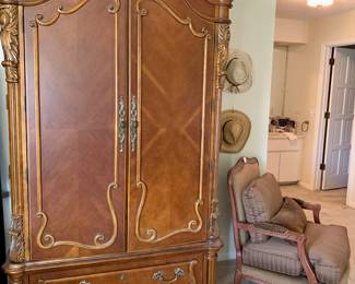 Wonderful Armoire/ Entertainment cabinet. Ashley Manor custom Chair