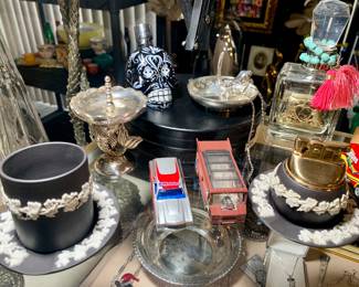 Wedgewood ashtray and lighter, sterling silver small tray. Perfume bottles and mini day of the dead bottles