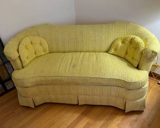 Vintage yellow curved loveseat