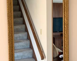 Gold framed wall mirror