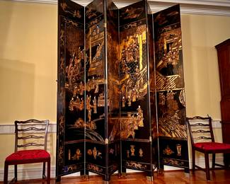 PAIR OF SPECTACULAR early 20th century Ming style carved lacquer Chinese screens with 6 20” panels each. As shown each spreads about 7’ wide. Stands 9’ tall and can be joined together. This shot shows just one 6 panel screen.