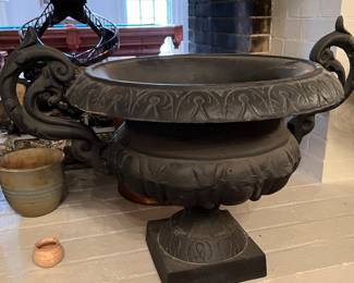 THERE ARE ABOUT 10 OF THESE GARDEN URNS