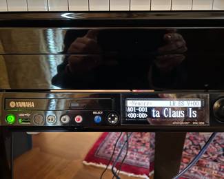 disklavier DKC 850  player system...plays floppy discs, cd's and can connect to internet with a subscription to play song lists