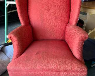 Reproduction wingback chair. Will need to be reupholstered