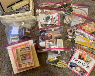 Many craft items for adults and children. Sketchpads, drawing supplies, paints, sewing materials, Markers, crayons, material. 
