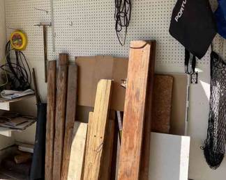 Wood And What Is Hanging On Pegboard