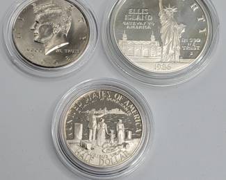 1986 Ellis Island Dollar (90% Silver), 1986 Clad Half Dollar & 2008-P Kemmedy Half Dollar
