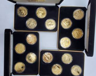 Grand Casino Tokens in Cases -- 16 in all
