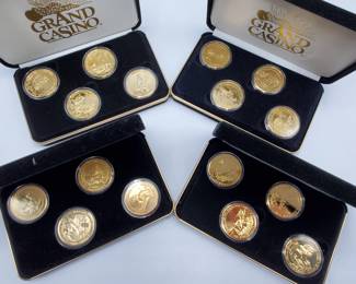 Grand Casino Tokens in Cases -- 16 in all
