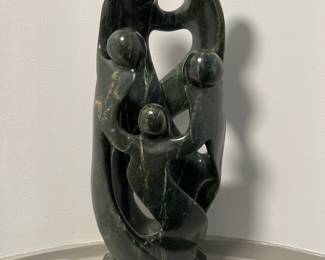 Hand Carved Family of five rock sculpture 