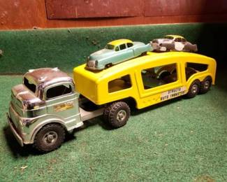 #8582 • Vintage Structo Truck and Structo Auto Transport Trailer with 4 Cars
