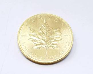 #150 • 1 Oz Canadian Maple Leaf .9999 Gold Coin
