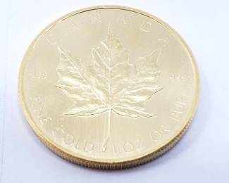 #130 • 1 Oz Canadian Maple Leaf .9999 Gold Coin
