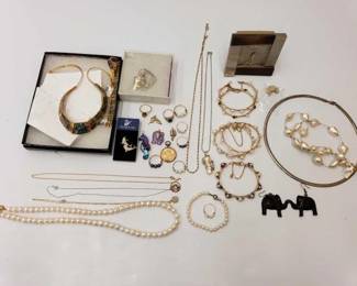#827 • Costume Jewelry With Clock
