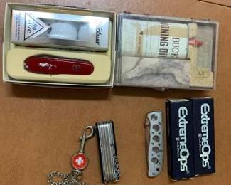 #10571 • Buck Knives Honing Oil, 2 Swiss Army Knifes, Smith&Wesson Knifes
