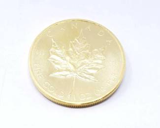 #158 • 1 Oz Canadian Maple Leaf .9999 Gold Coin
