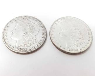 #176 • 2 1886 Morgan Silver Dollars
