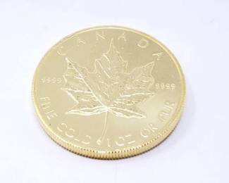#154 • 1 Oz Canadian Maple Leaf .9999 Gold Coin

