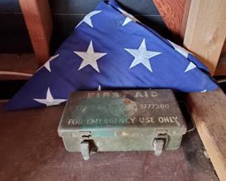 #2422 • Folded Flag and US Army First Aid Kit
