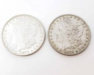 #220 • 1878 And 1879 Morgan Silver Dollars

