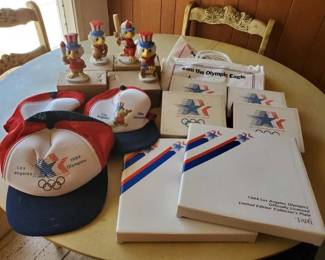 #8038 • 3 Olympic Hats, 4 Sam The Olympic Eagles, 2 LA Olympics Collectors Plates, 4 Ceramic Picture Frames
