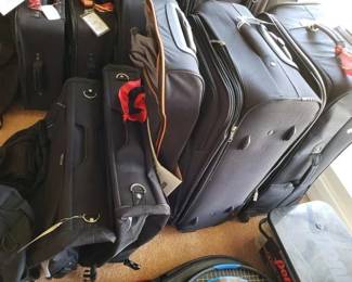 #12060 • 8 Duffle Bags and Suit Cases
