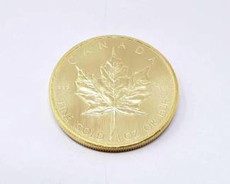 #120 • 1 Oz Canadian Maple Leaf .9999 Gold Coin
