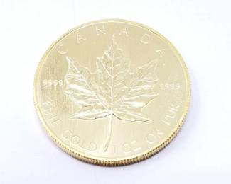 #118 • 1 Oz Canadian Maple Leaf .9999 Gold Coin

