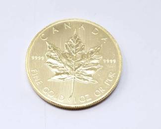 #140 • 1 Oz Canadian Maple Leaf .9999 Gold Coin
