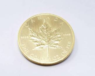 #132 • 1 Oz Canadian Maple Leaf .9999 Gold Coin
