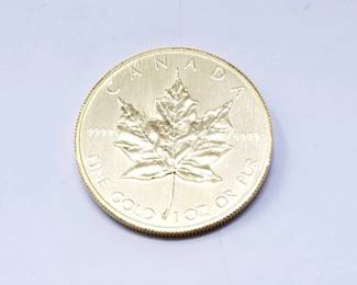 #138 • 1 Oz Canadian Maple Leaf .9999 Gold Coin
