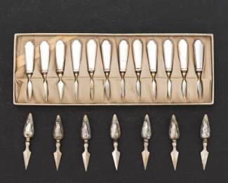 A Group of Sterling Silver Handled Corn on the cob Holders 