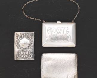 A Group of Three Sterling Silver Holders 