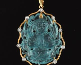A Carved Blue Gemstone Buddha, Gold and Diamond Pendant