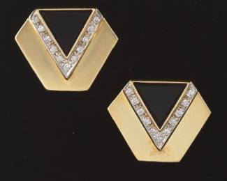 A Pair of Gold, Onyx and Diamond Earrings 