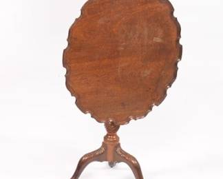 A Piecrust Tilt Top Table
