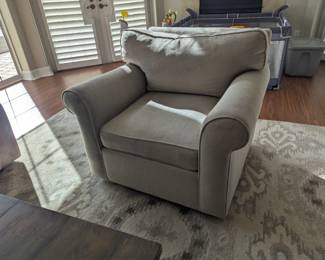 Haverty easy chair, wool rug