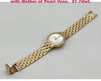 Lot 1821 14K Gold MOVADO Wrist Watch with Mother of Pearl Vase. 27.7dwt.