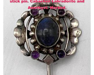 Lot 1745 Early GEORG JENSEN 830 silver stick pin. Cabachon Labradorite and Amethyst. Marked.