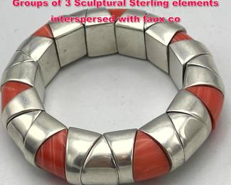 Lot 1883 Mexican Sterling Silver Bracelet. Groups of 3 Sculptural Sterling elements interspersed with faux co