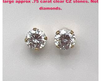 Lot 1847 Pair 14k Gold earrings with single large approx .75 carat clear CZ stones. Not diamonds. 