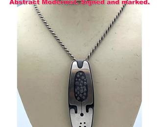Lot 1812 TUTTLE sterling Silver Pendant. Abstract Modernist. Signed and marked.